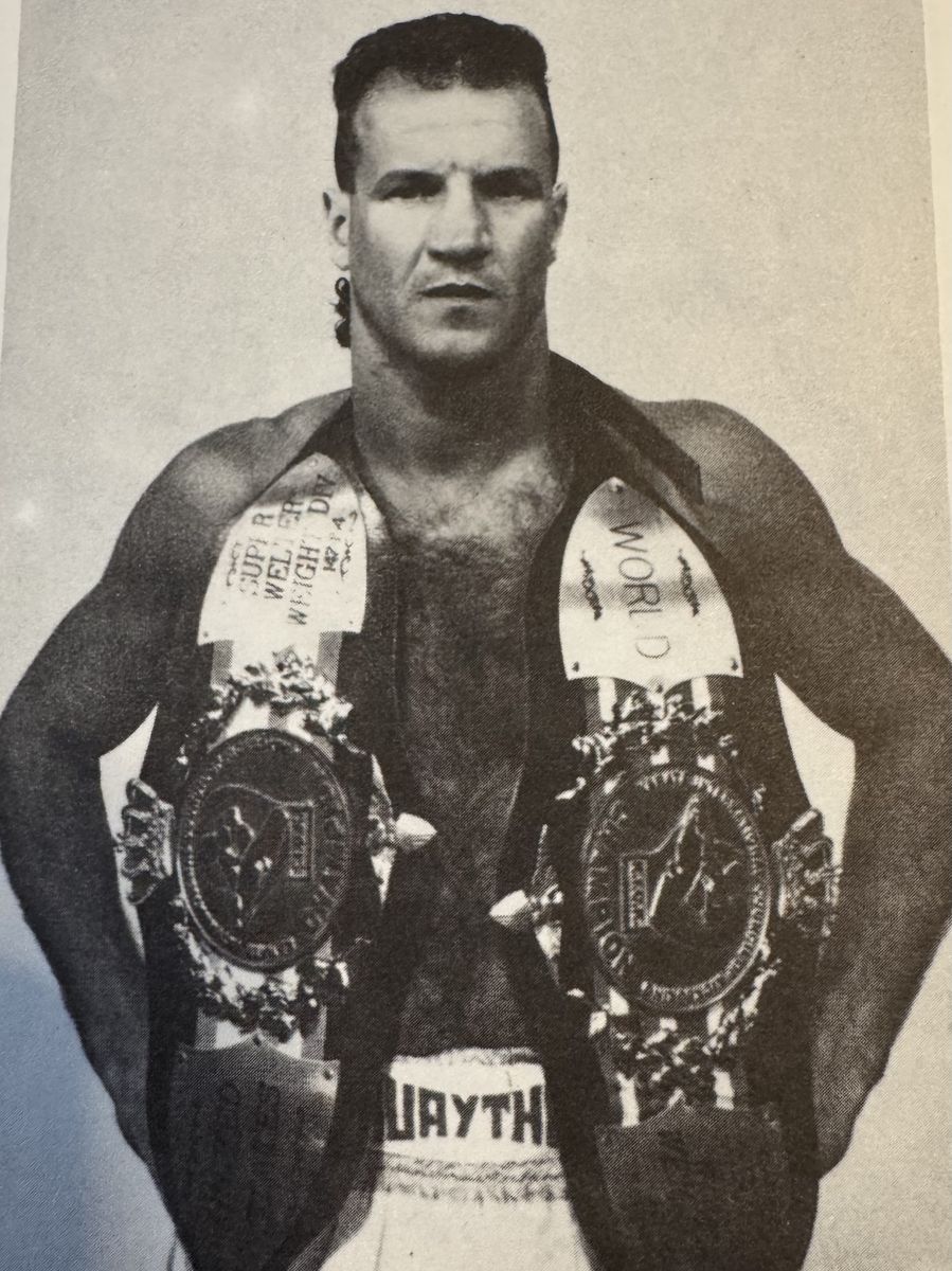 Young Peter Manfredo Sr. with two world championship belts