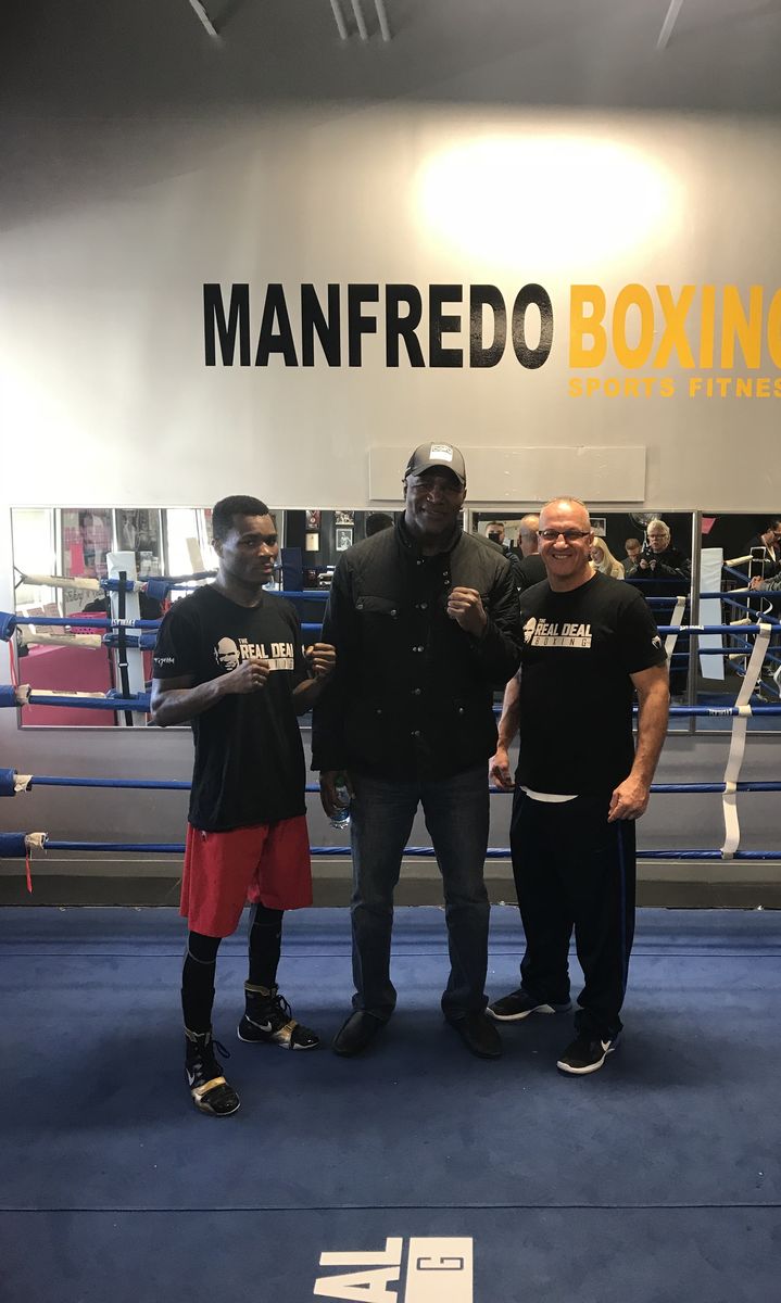 Peter Manfredo Sr. with fighters at the gym