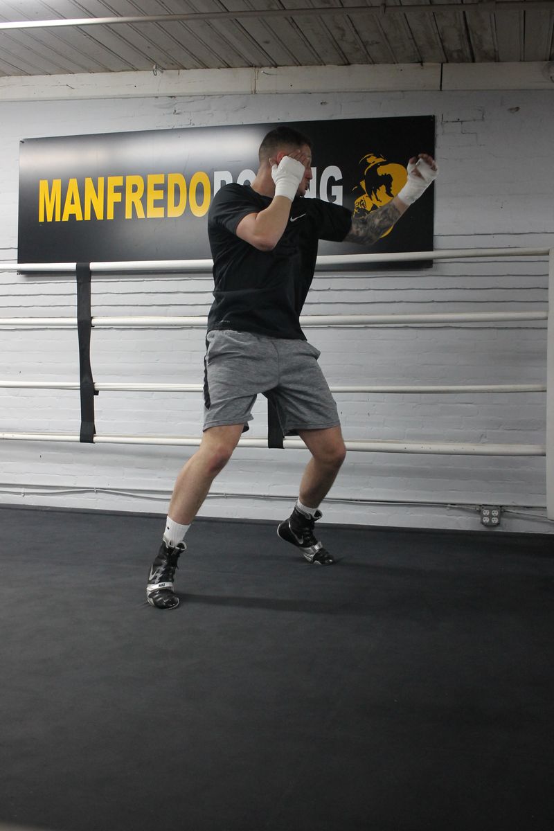 Fighter with Manfredo banner