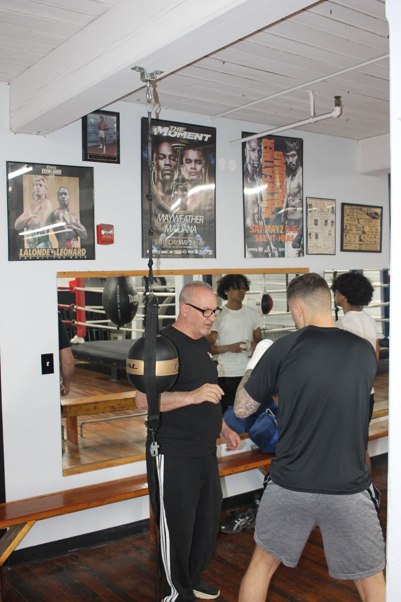 Peter Sr. coaching at the speed bag